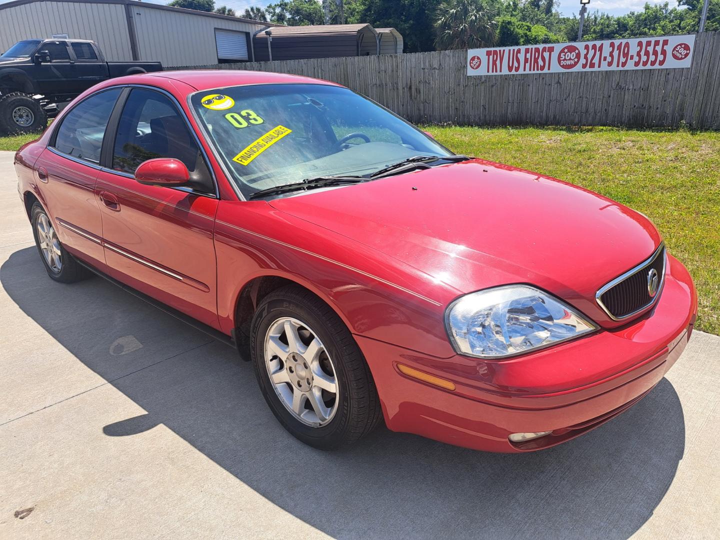 2003 RED /BEIGE Mercury Sable (1MEFM55S43A) , located at 1181 Aurora Rd, Melbourne, FL, 32935, (321) 241-1100, 28.132914, -80.639175 - Photo#1